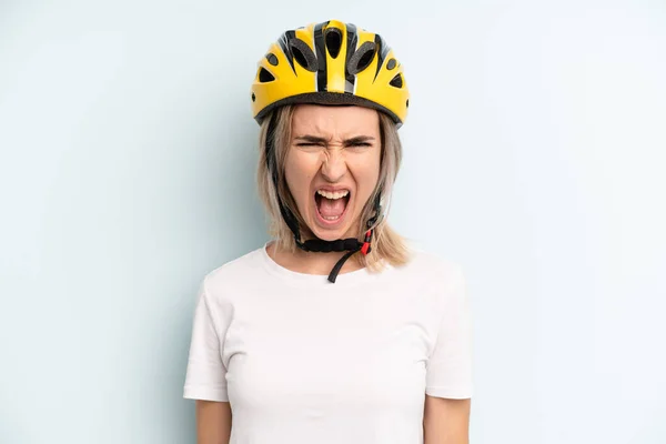 Blonde Woman Shouting Aggressively Looking Very Angry Bike Sport Concept — Stockfoto
