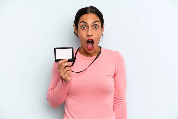Hispanic Woman Looking Very Shocked Surprised Vip Pass Card — Stock fotografie