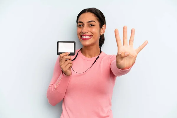 Hispanic Woman Smiling Looking Friendly Showing Number Four Vip Pass — Stock fotografie