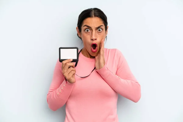 Hispanic Woman Feeling Shocked Scared Vip Pass Card — Stock fotografie