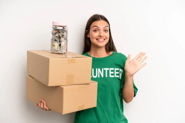 Pretty Woman Smiling Happily Waving Hand Welcoming Greeting You Volunteer — Stockfoto