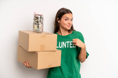 pretty woman looking arrogant, successful, positive and proud. volunteer and donation concept