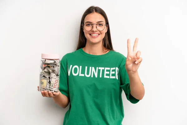 Pretty Woman Smiling Looking Happy Gesturing Victory Peace Volunteer Donation — Stockfoto