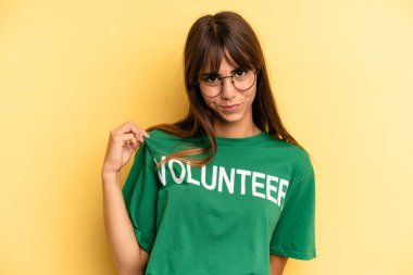 pretty woman looking arrogant, successful, positive and proud. volunteer and donation concept