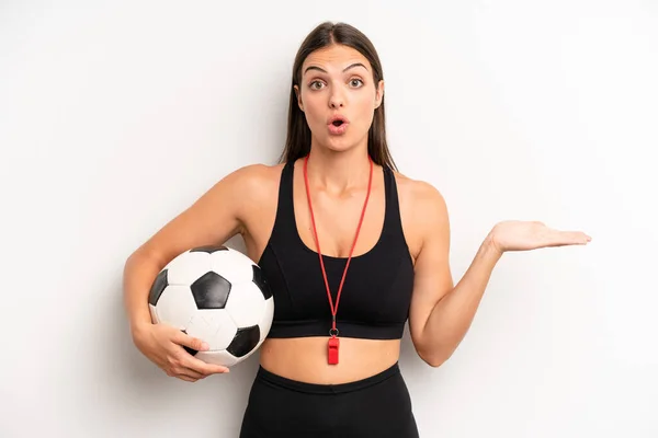Pretty Girl Looking Surprised Shocked Jaw Dropped Holding Object Soccer — Stockfoto