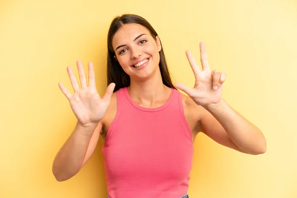 Young Adult Pretty Woman Smiling Looking Friendly Showing Number Eight — Stock Photo, Image