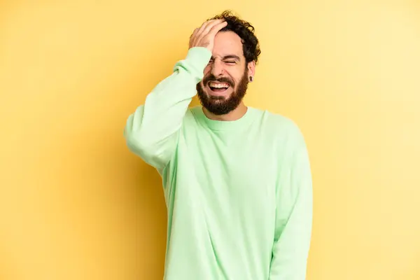 Young Adult Bearded Man Laughing Slapping Forehead Saying Doh Forgot — Stock Photo, Image