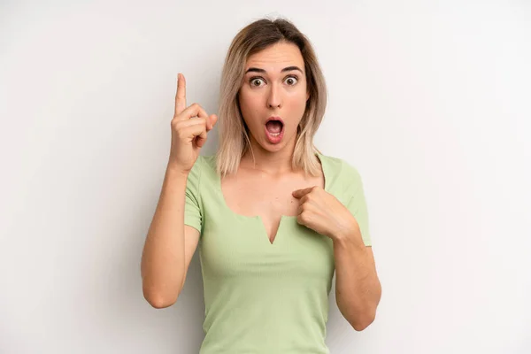Young Adult Blonde Woman Feeling Proud Surprised Pointing Self Confidently — Stock Photo, Image