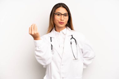 Asyalı genç bir kadın kapiş ya da para hareketi yapıyor, sana ödemeni söylüyor. doktor konsepti