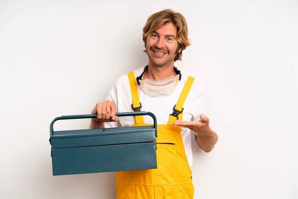 Adult Blond Man Smiling Cheerfully Feeling Happy Showing Concept Repairman — Stockfoto