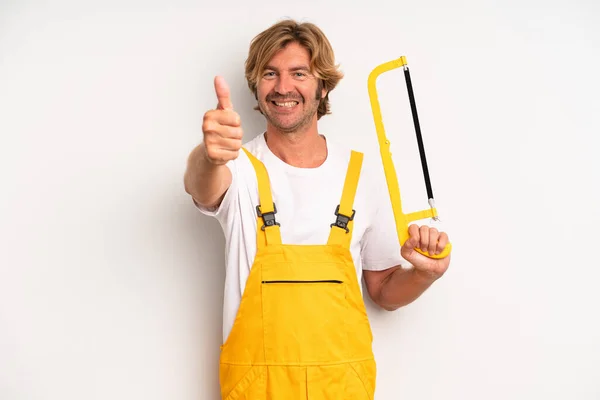 Adult Blond Man Feeling Proud Smiling Positively Thumbs Handyman Saw — Stockfoto