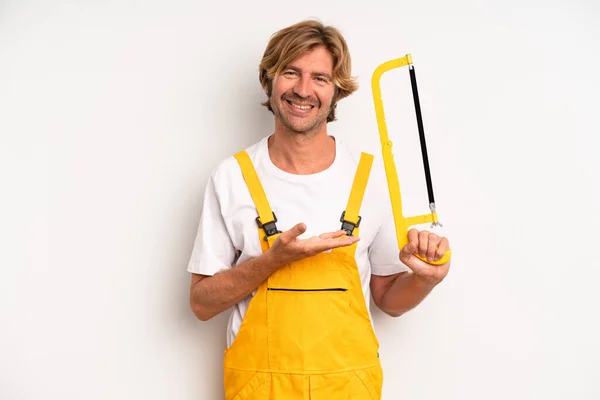 Adult Blond Man Smiling Cheerfully Feeling Happy Showing Concept Handyman — Stockfoto
