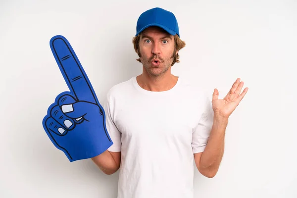 Adult Blond Man Looking Surprised Shocked Jaw Dropped Holding Object — Stockfoto