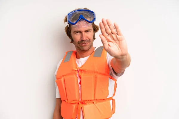 Adult Blond Man Looking Serious Showing Open Palm Making Stop — Stock Photo, Image