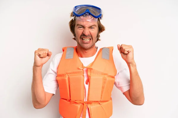 Adult Blond Man Shouting Aggressively Angry Expression Life Jacket Concept — Zdjęcie stockowe