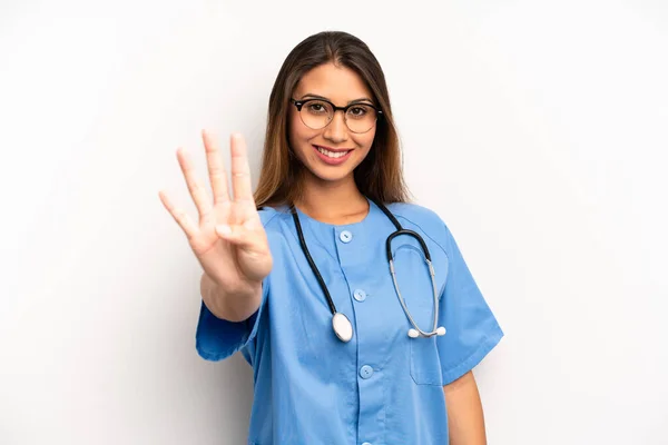 Asian Young Woman Smiling Looking Friendly Showing Number Four Nurse — Stockfoto
