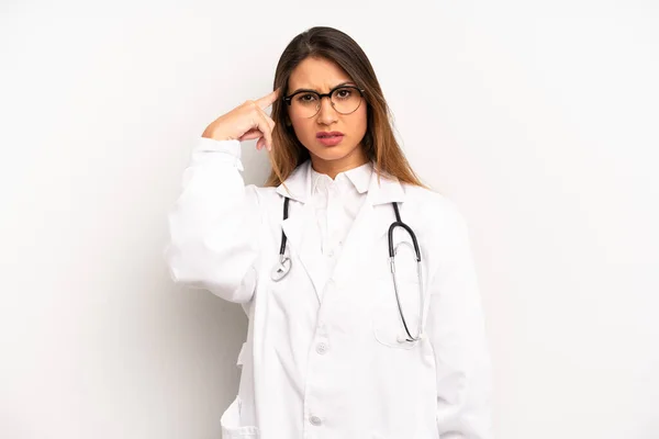 Asian Young Woman Feeling Confused Puzzled Showing You Insane Doctor — Zdjęcie stockowe