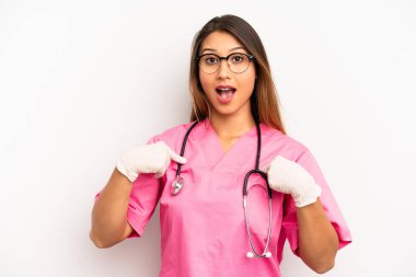 asian young woman feeling happy and pointing to self with an excited. veterinarian student concept