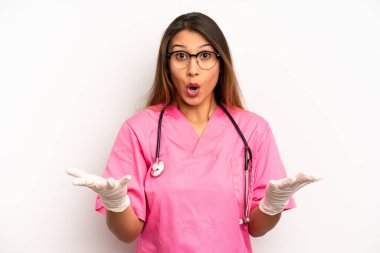 asian young woman amazed, shocked and astonished with an unbelievable surprise. veterinarian student concept