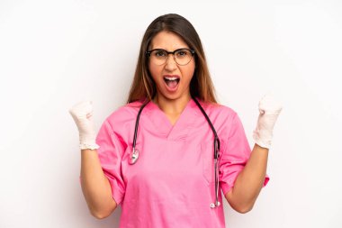 asian young woman shouting aggressively with an angry expression. veterinarian student concept