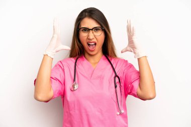 asian young woman screaming with hands up in the air. veterinarian student concept
