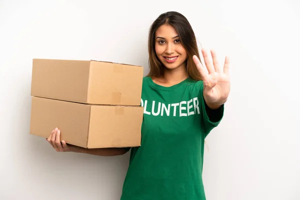 Asian Young Woman Smiling Looking Friendly Showing Number Four Donation — Foto Stock