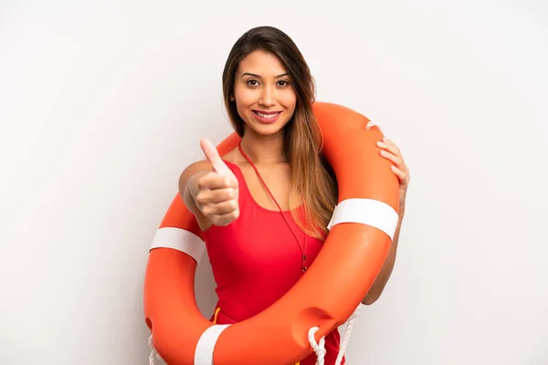 Asian Young Woman Feeling Proud Smiling Positively Thumbs Lifeguard Concept — стоковое фото