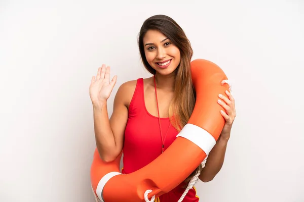 Asian Young Woman Smiling Happily Waving Hand Welcoming Greeting You — Stock Photo, Image