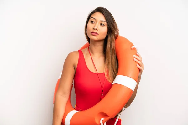 Asian Young Woman Profile View Thinking Imagining Daydreaming Lifeguard Concept — Stock Photo, Image