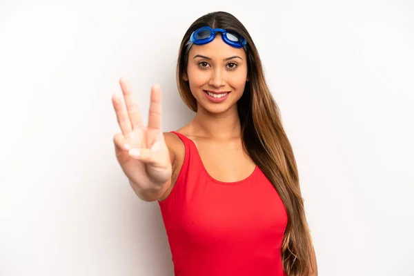 Asian Young Woman Smiling Looking Friendly Showing Number Three Swimmer — Stock Photo, Image