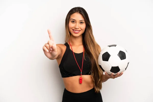 Asian Young Woman Smiling Looking Friendly Showing Number One Soccer —  Fotos de Stock