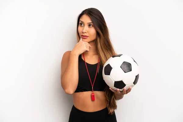 Asian Young Woman Thinking Feeling Doubtful Confused Soccer Fitness Concept — Stockfoto