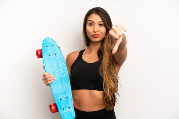 Asian Young Woman Feeling Cross Showing Thumbs Skate Board Concept — ストック写真