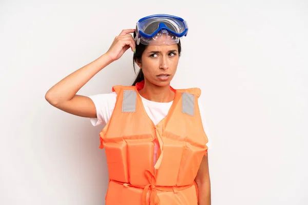 Hispanic Pretty Woman Feeling Puzzled Confused Scratching Head Life Jacket — Stock Photo, Image