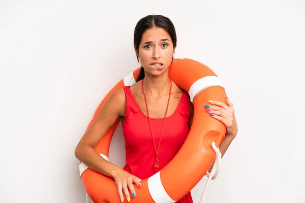 Hispanic Pretty Woman Looking Puzzled Confused Lifeguard Concept — Stock Photo, Image
