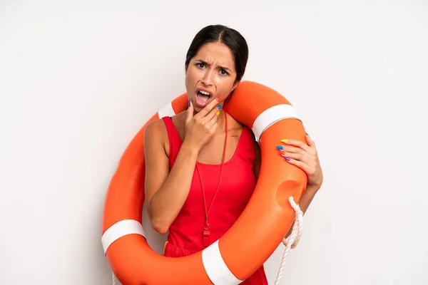 Hispanic Pretty Woman Mouth Eyes Wide Open Hand Chin Lifeguard — Stock Photo, Image