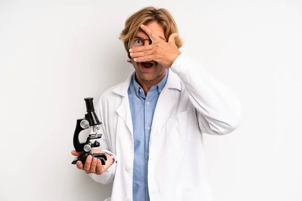 Blond Adult Man Looking Shocked Scared Terrified Covering Face Hand — Stock Photo, Image