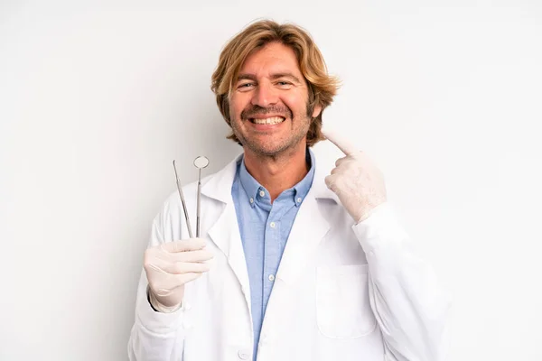Blond Adult Man Smiling Confidently Pointing Own Broad Smile Dentist — Fotografie, imagine de stoc