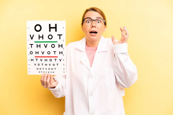 Pretty Blonde Young Woman Screaming Hands Air Optical Vision Test — Foto de Stock