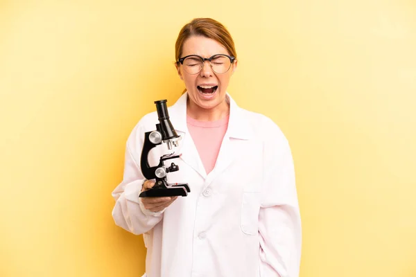 Pretty Blonde Young Woman Shouting Aggressively Looking Very Angry Scients — Foto Stock