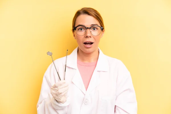 Pretty Blonde Young Woman Looking Very Shocked Surprised Dentist Student — Stock fotografie