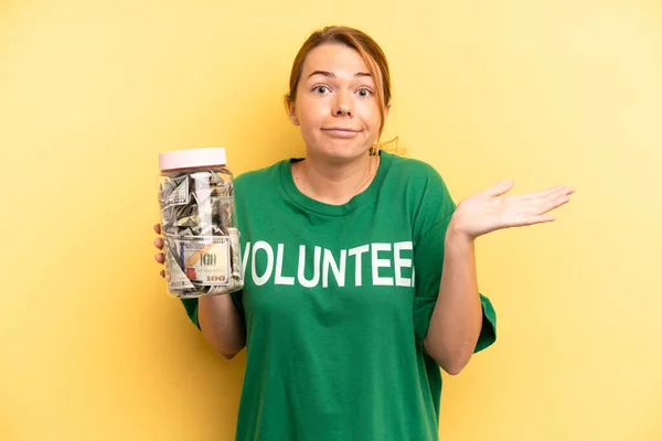 Pretty Blonde Young Woman Feeling Puzzled Confused Doubting Donation Volunteer — Stock fotografie