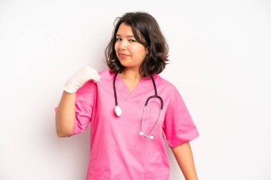 hispanic pretty girl feeling shocked and scared. nurse concept