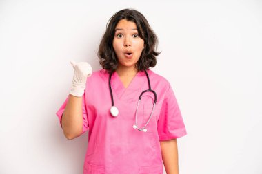hispanic pretty girl feeling sad and whiney with an unhappy look and crying. nurse concept