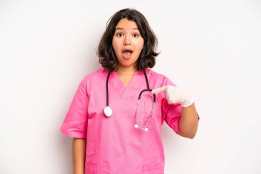 hispanic pretty girl feeling bored, frustrated and sleepy after a tiresome. nurse concept