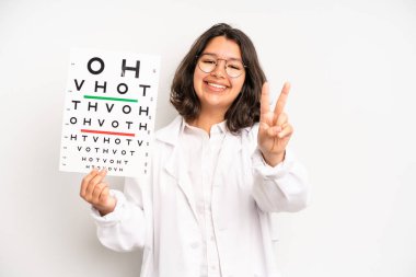 hispanic pretty girl looking serious showing open palm making stop gesture. optical vision test concept