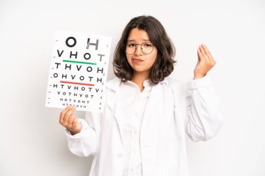 hispanic pretty girl looking excited and surprised pointing to the side. optical vision test concept