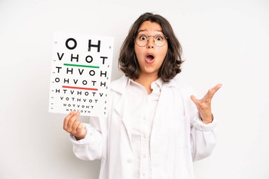 hispanic pretty girl feeling sad and whiney with an unhappy look and crying. optical vision test concept