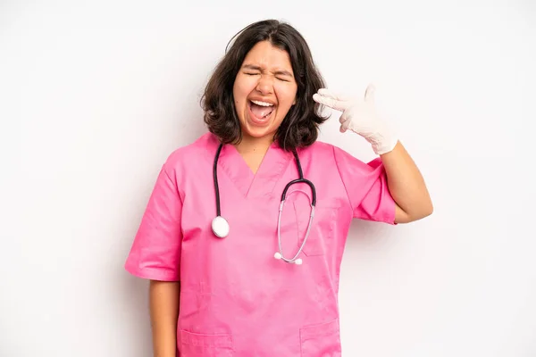 Hispanic Pretty Girl Feeling Happy Facing Challenge Celebrating Nurse Concept — Stock Fotó