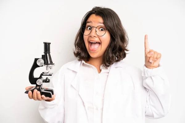Hispanic Pretty Girl Feeling Puzzled Confused Scratching Head Science Student — Foto de Stock
